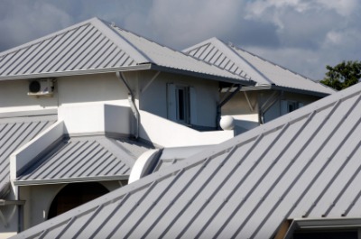 Gray metal roofs at an apartment complex. Photo by titine974 on iStockphoto.