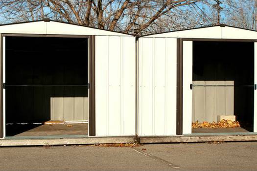 Prefabricated vinyl outdoor storage buildings retailers comparison: Home Depot vs Menard's