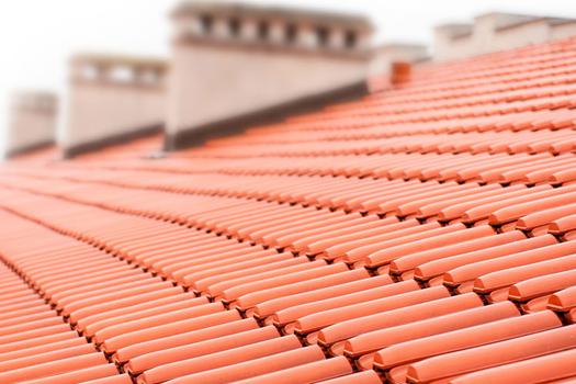 Asphalt shingles vs traditional tile roofing