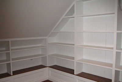 Custom built attic shelving systems by Hawthorn Builders