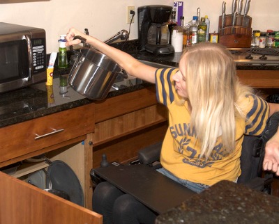 Low countertops are needed when kitchen remodeling for a physical disability. Photo by easystand on Flickr.