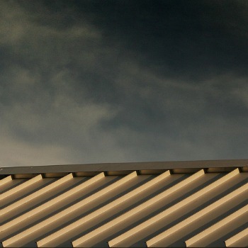 Various types of roofing materials exist. A metal roof is often overlookd for residential homes. Yet it creates a unique look.