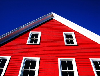 Be bold and select a red color for your siding, no matter what siding material you choose. Photo by swisscan on Flickr.  