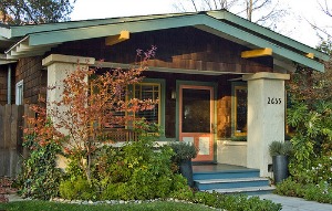 This home mixes wood shingles with stucco. Photo by j l t on Flickr.